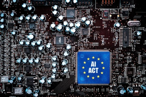 Computer board with EU flag and inscription AI Act, photo montage +++ editorial use only