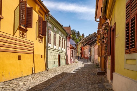 The colorful houses of the old town of Sighisoara or Sighi?oara, Transylvania, Romania