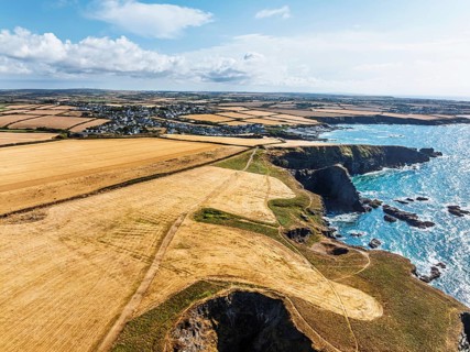 View of Trevone Beach and Trevone Bay from a drone, Trevone, Padstow, Cornwall, England, United