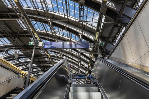 Blue information displays on the escalators leading to the platform at Berlin's Ostbahnhof, Berlin,