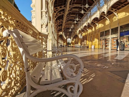 Curved benches and decorated corridor in historic architectural design, Maxim Gorki Kollonade,