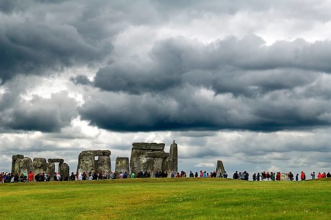 Tourists visit Stonehenge, around 3000 BC, a megalithic structure of the Neolithic period,