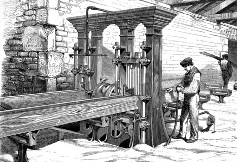 A frame saw, a vertical saw frame in which several saw blades are clamped in parallel within a