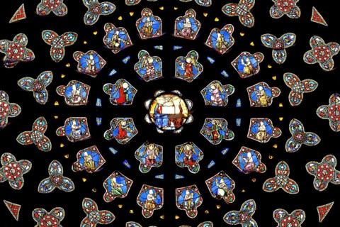 Circular glass rosette with ornate stained glass representations, Saint-Paul-Aurélien Cathedral in