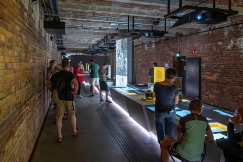 Visitors in an exhibition room from the Museum Documentation Center, Documentation Center
