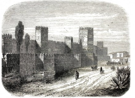 Wood engraving from 1878 depicts the Moorish fortification walls of Seville in Andalusia, Spain.