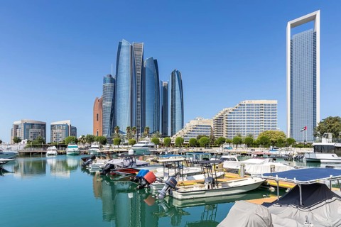Abu Dhabi Skyline Etihad Towers skyscrapers with marina yacht harbor in Abu Dhabi, United Arab