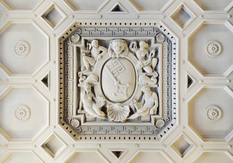 View from bottom to top of the stucco ceiling of the ballroom with Bremen key in the New Bremen