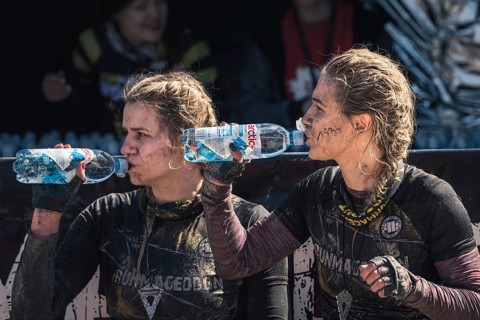 WROCLAW, POLAND - APRIL 7, 2018: Extreme running with obstacle RUNMAGEDDON. In the picture a runner