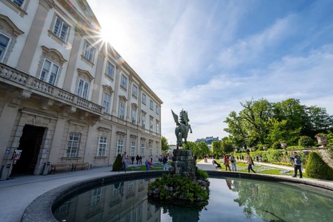 Mirabelle Garden with Pegasus Fountain and Mirabell Palace, Sun Star, Hohensalzburg Fortress in the