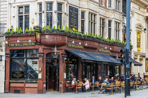 The Wellington, a Victorian corner pub named for the Duke of Wellington, stands on The Strand,
