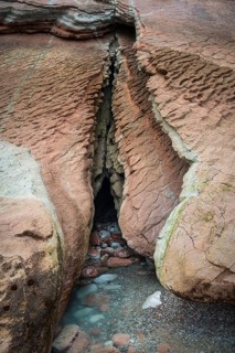 Distinctive rock cliffs as a geological formation of rock layers, Flysch on Itzurun Beach in