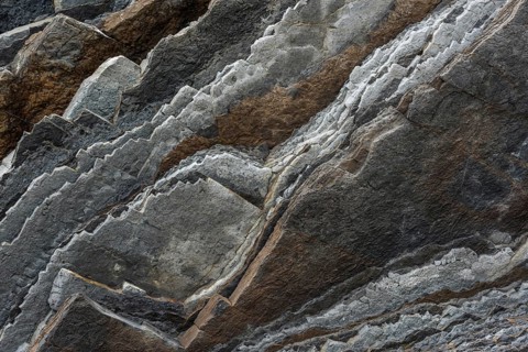 Geological formation of sandstone and limestone layers, Flysch on Itzurun Beach in Zumaia, Spain