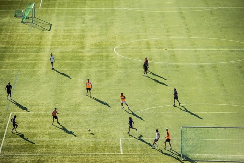 Soccer player on a soccer field, hobby soccer player, aerial view, bird's-eye view, Freiburg im