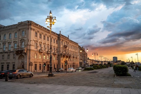 Magnificent Palazzo del Lloyd Triestino on the Riva del Mandracchio seafront, dramatic clouds at