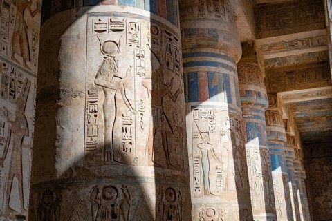 Close up details of the reliefs and hieroglyphs inside Medinat Habu, the ancient Egyptian Mortuary