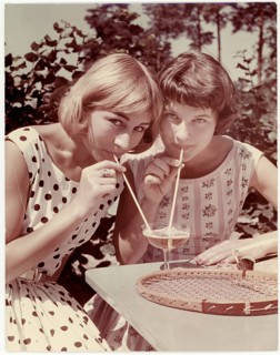 Summer, young girls drinking spritzer, out of a glass, Berliner Weisse, tennis, two woman drinking