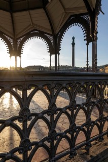 24.4.2026: The ornate cast iron music pavilion on Schlossplatz at sunrise. Sun star effect through