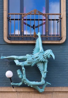 Figures on the façade of the Dille & Kamille department store, formerly a theatre, Enschede, the