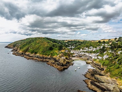 Polperro Harbour and Village from a drone, Polperro, Looe, Cornwall, England, United Kingdom
