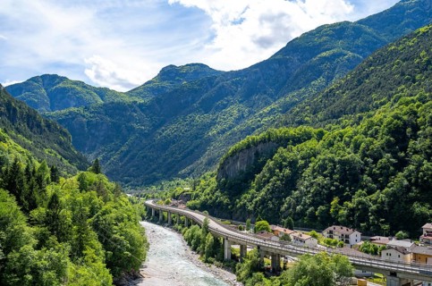 Mountain landscape and river La Fella in Eisental with highway, Dogna, Julian Alps, Friuli-Venezia