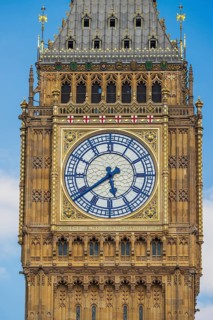 Gilded Roman numerals and tracery detail the Elizabeth Tower clock face, home to Big Ben, at the