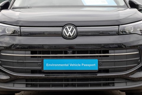 (Photo montage) New VW with the inscription ENVIRONMENTAL VEHICLE PASSPORT on the license plate