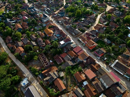 Aerial view, mountain landscape with part of the village of Nong Khiaw on the banks of the Nam Ou