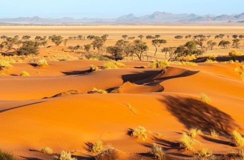 Evening atmosphere, sand dunes, landscape in the NamibRand Nature Reserve, Naukluft Mountains in