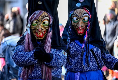 Members of a fools' guild in traditional Haes, fools' clothes, during the carnival procession in