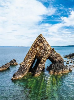 Blackchurch Rock and Cliffs over Mouthmill Beach from a drone, North Devon Coast, Devon, England,
