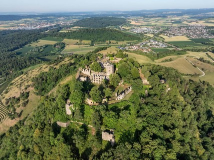 Aerial view of the Hohentwiel volcanic cone with Germany's largest fortress ruin, in the morning