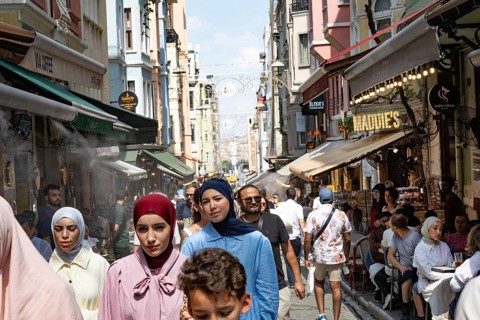Istanbul, Turkey. August 7th 2026. Busy streets crowded with tourists around the Galata Tower in