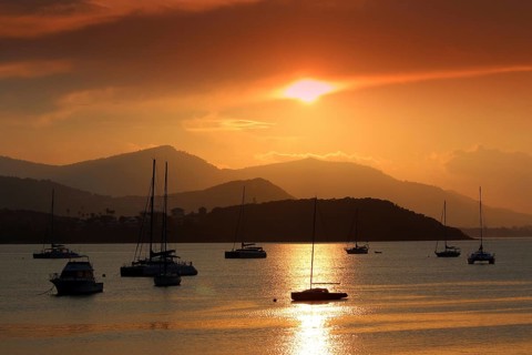 Boats in the evening light off Ko Samui, Kho Samui, Thailand. asia