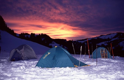 Winter bivouac, evening sky, sunset, tent, snow, snowshoes, Allgäu, Germany