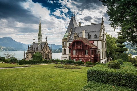 Picturesque castle with lakeside park in the mountains, Meggenhorn Castle, Meggen, Lake Lucerne,
