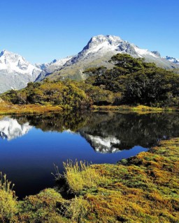 Key Summit with reflection of Mt. Christina, Fjordland National Park, World Heritage Site South