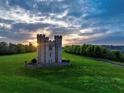 Sunset over Hiorne's Tower from a drone, Arundel, West Sussex, England, United Kingdom