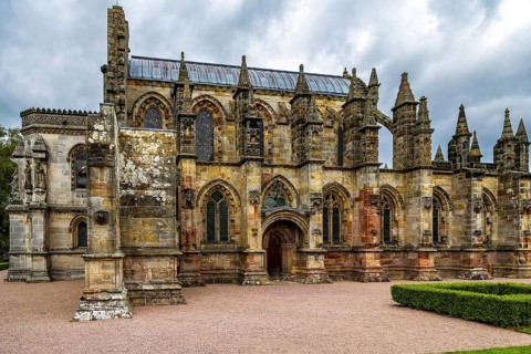 Used as a film set for The Da Vinci Code, the exterior of the 15th century Rosslyn Chapel shows its