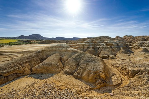 Rock formation caused by erosion in the morning backlight in the Bardenas Reales Natural Park,