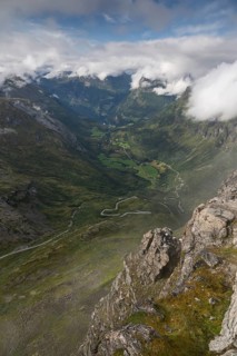Famous curvy mountain road Fylkesvei 63 or Geirangervegen, which leads from Geiranger to the