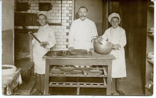 Baker, journeyman, oven, profession, working life, three men in a bakery working with dough and