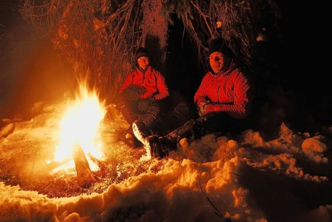 Two men around a campfire, Muddus National Park, Laponia World Heritage Site, Lapland, Norrbotten,