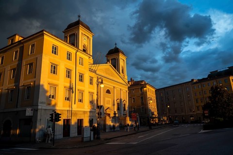 San Nicolò Greek Orthodox Church on the Riva del Mandracchio seafront in the evening light at