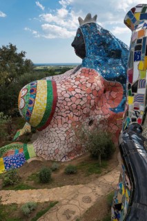 Colourful sculpture, female figure, nana, fantasy house, Giardino dei Tarocchi or garden of tarot,
