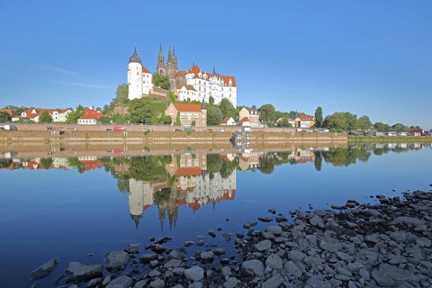 Cityscape with castle hill with Albrechtsburg and cathedral, reflection in the river Elbe at low