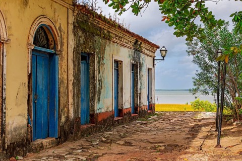 Historic houses weathered by time facing the sea in Alcantara, Maranhao, Alcantara, Maranhao,