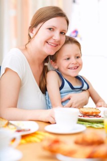 Mother and son having breakfast together, Finland, Scandinavia
