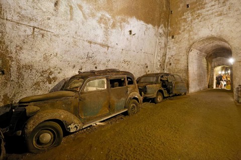 Rotten cars from the 1950s, car cemetery, Galleria Borbonica, Bourbon Gallery, Naples underground,