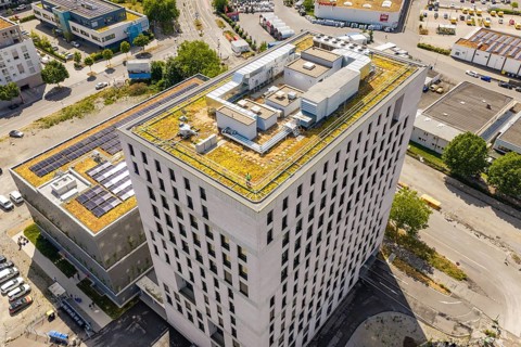 Roof view of a modern high-rise building with green use and urban environment, Boarding House of